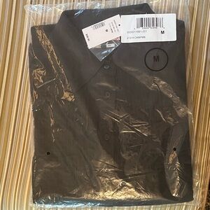 Ricki’s gauze button down long sleeve shirt. Classic fit. NWT.